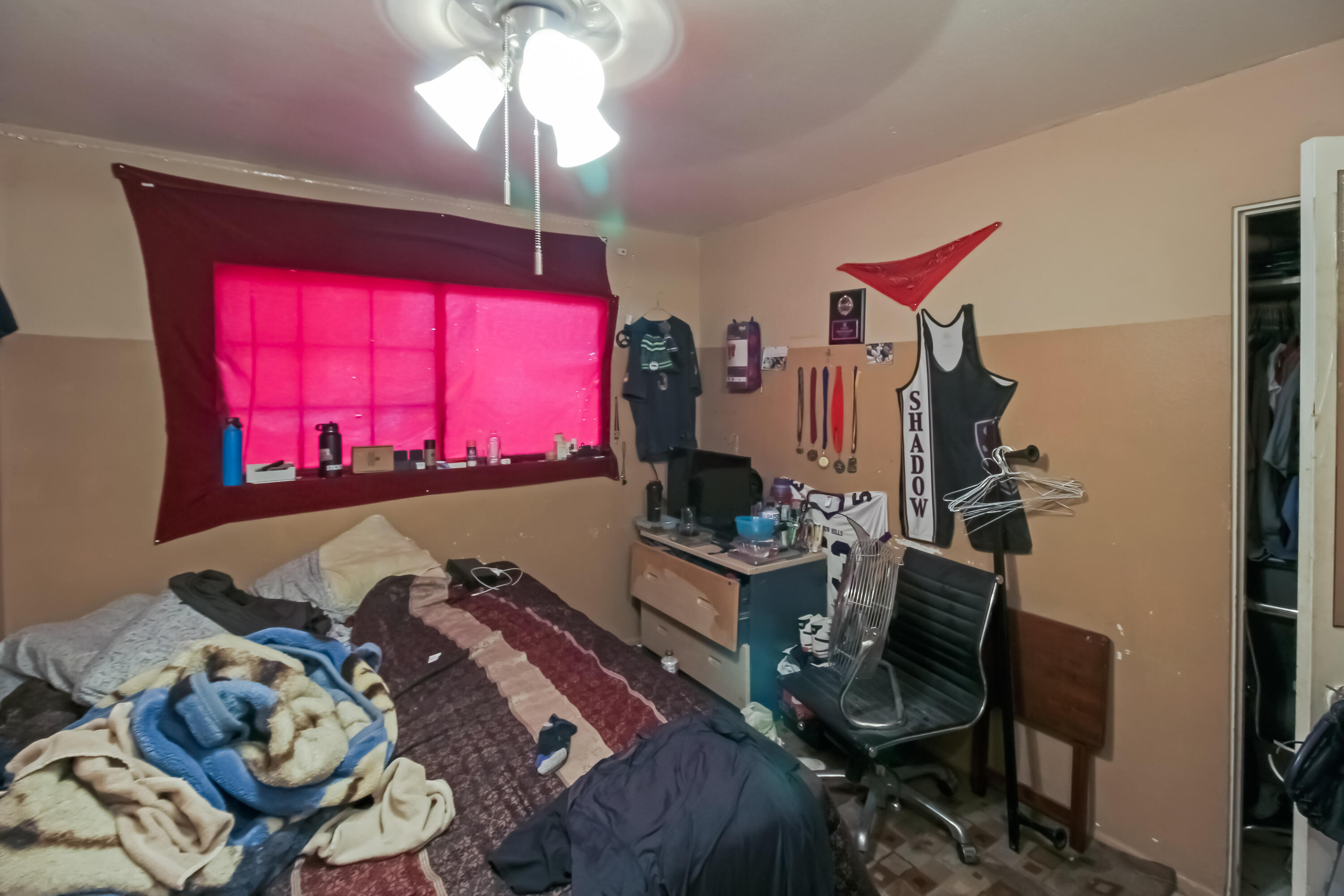 82321 Adobe Road Indio, CA 92201 - Photo 6 of 12 a view of a workspace with furniture and a flat screen tv