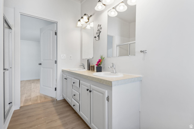 2600 North Hill Field Road, Unit 86 Layton, UT 84041 - Photo 12 of 25 Full bath featuring double vanity and light wood-type flooring