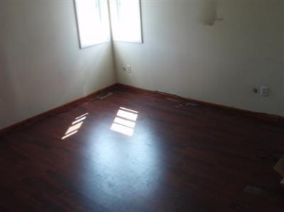 3744 Wirth Road Highland, IN 46322 - Photo 5 of 9 an empty room with wooden floor and windows