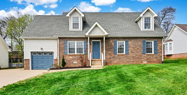 front view of a house and a yard