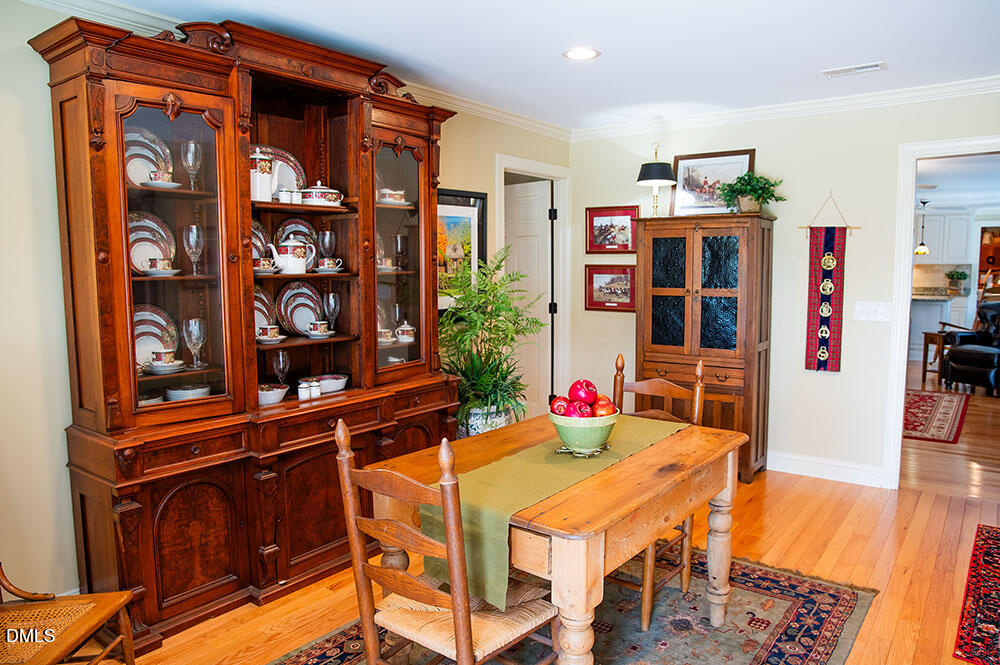 75 Frank Timberlake Road Timberlake, NC 27583 - Photo 7 of 93 a view of a dining room with furniture and wooden floor