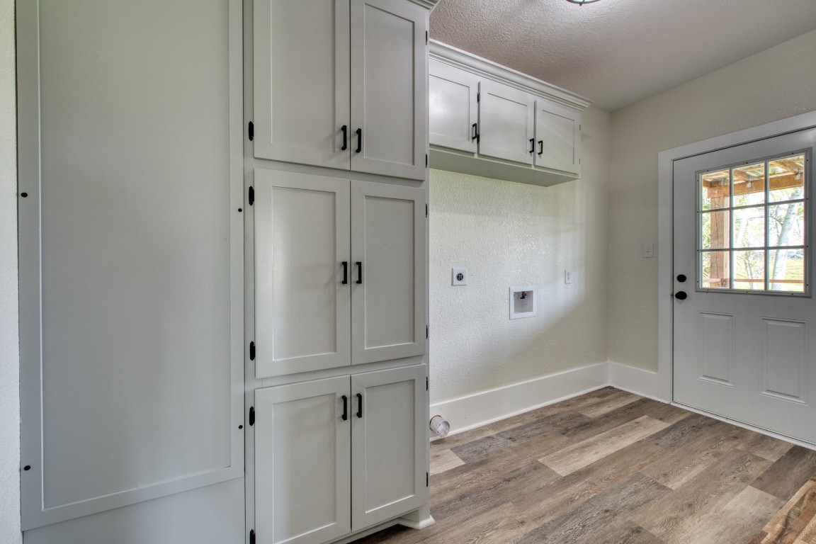 1122 West 2nd Street Freeport, TX 77541 - Photo 22 of 38 a view of kitchen with wooden floor