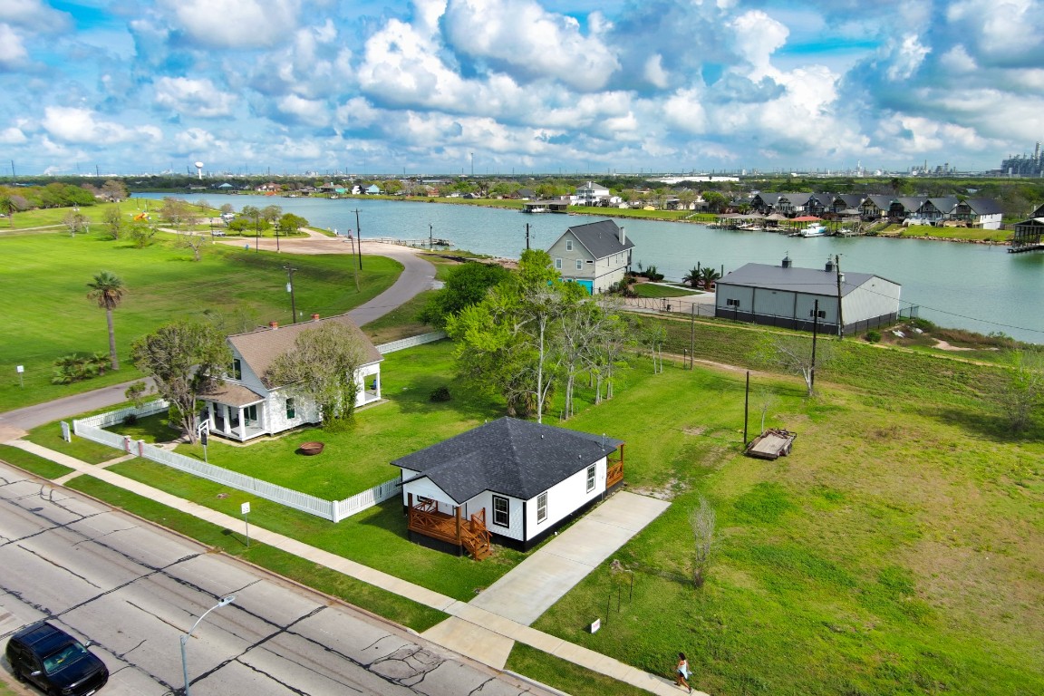 1122 West 2nd Street Freeport, TX 77541 - Photo 34 of 38 a view of a lake with a yard