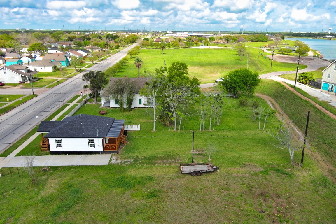 1122 West 2nd Street Freeport, TX 77541 - Photo 35 of 38 a view of a house with a yard