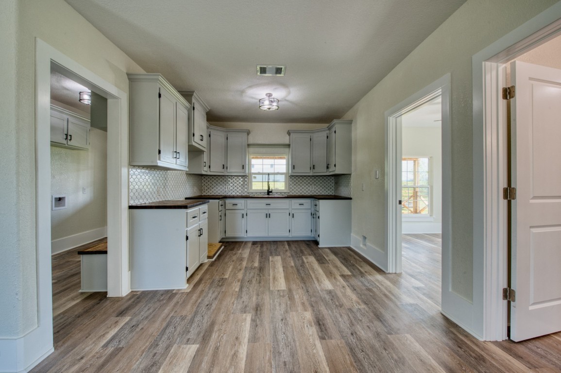 1122 West 2nd Street Freeport, TX 77541 - Photo 8 of 38 a view of a kitchen with electric appliances
