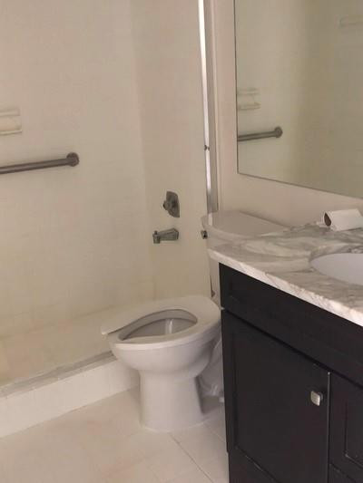 21 Brighton A, Unit A Boca Raton, FL 33434 - Photo 6 of 32 renovated bathroom with shower
