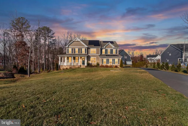 a view of a swimming pool with a lawn chairs