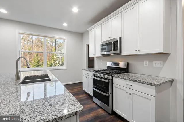 a view of closet area with empty racks