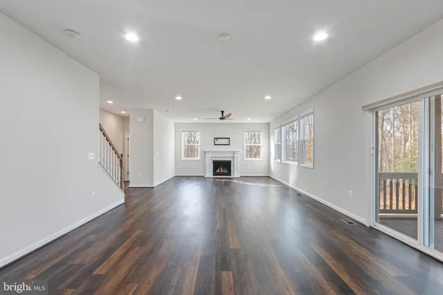 a view of a large window with wooden floor