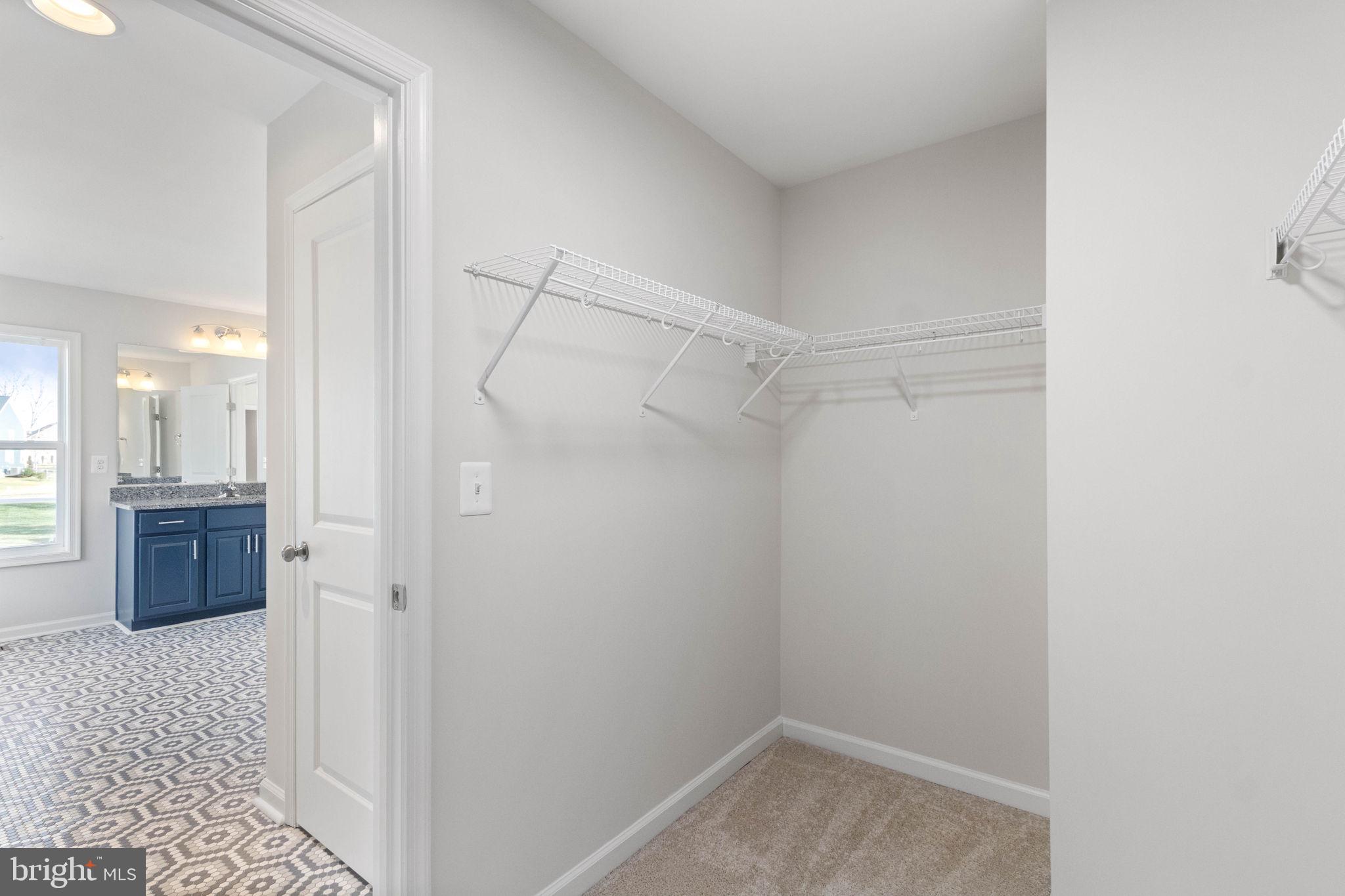 10602 Springvale Lane Spotsylvania, VA 22551 - Photo 39 of 92 a view of a walk in closet