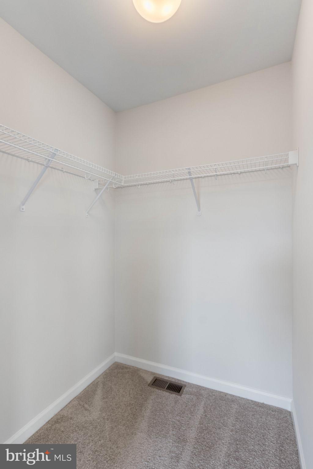 10602 Springvale Lane Spotsylvania, VA 22551 - Photo 58 of 92 a view of a room with shelf