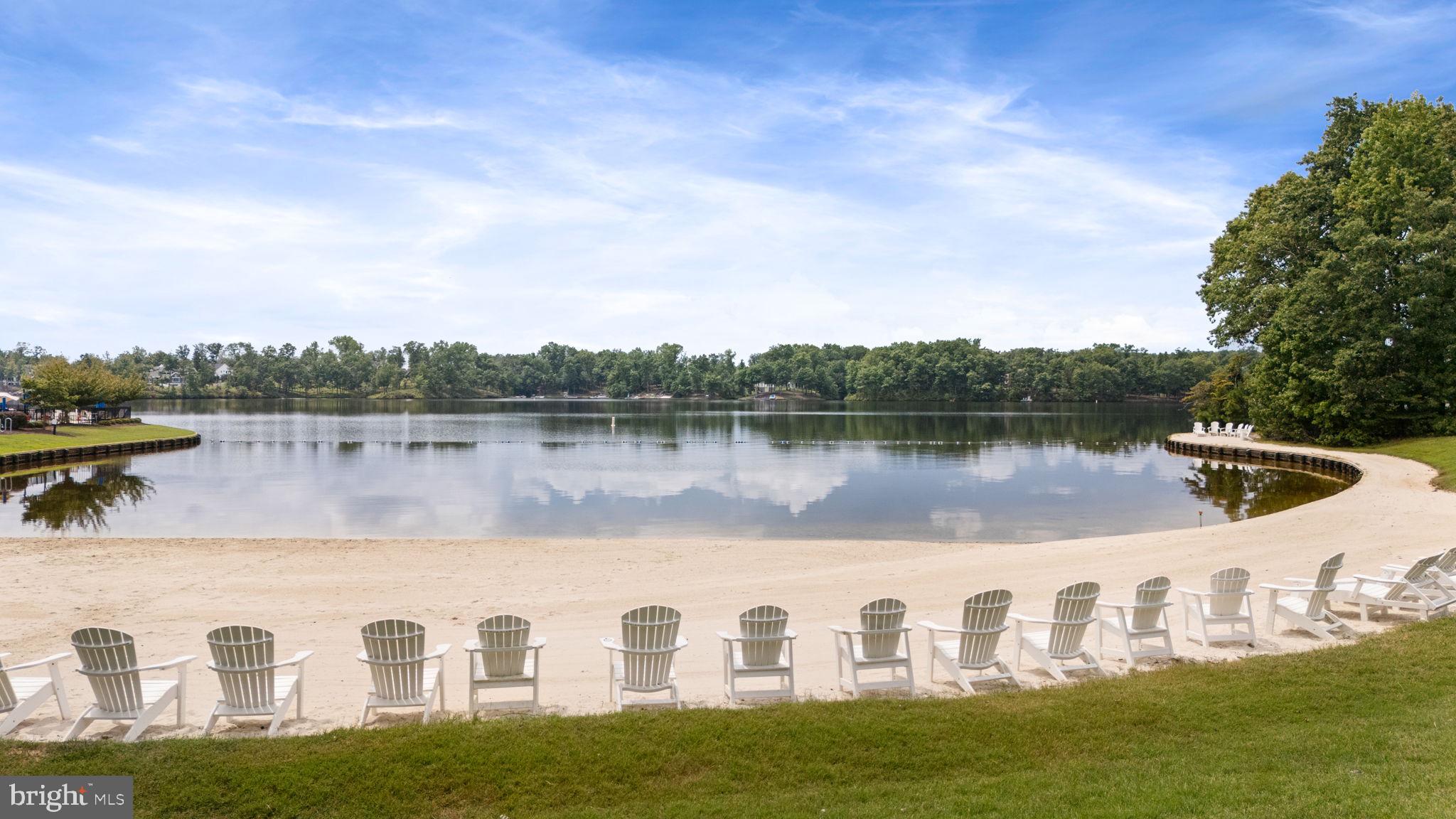 10602 Springvale Lane Spotsylvania, VA 22551 - Photo 91 of 92 a view of a lake with houses in the background
