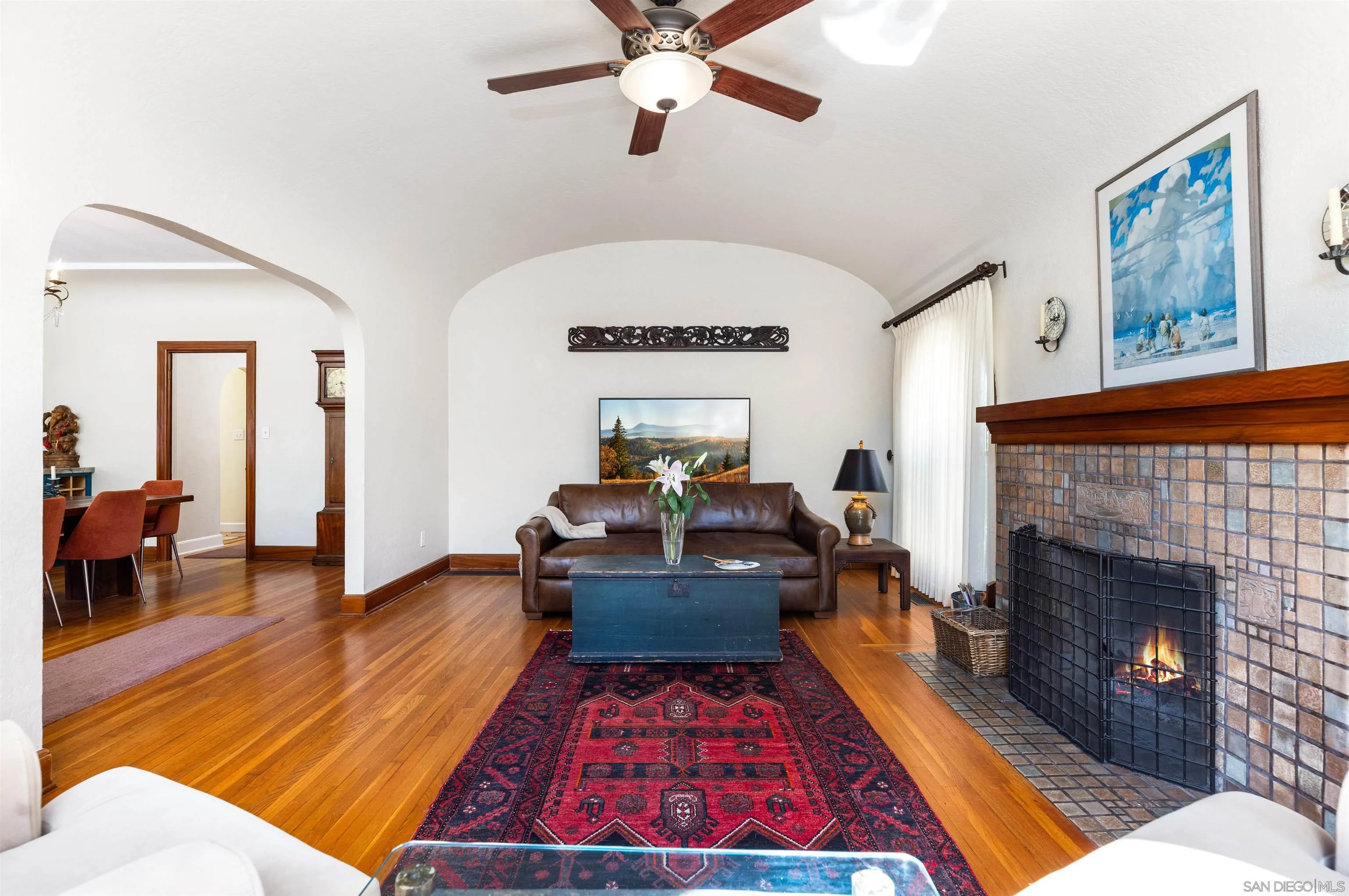 4192 Rochester Road San Diego, CA 92116 - Photo 15 of 38 a living room with furniture and a fireplace
