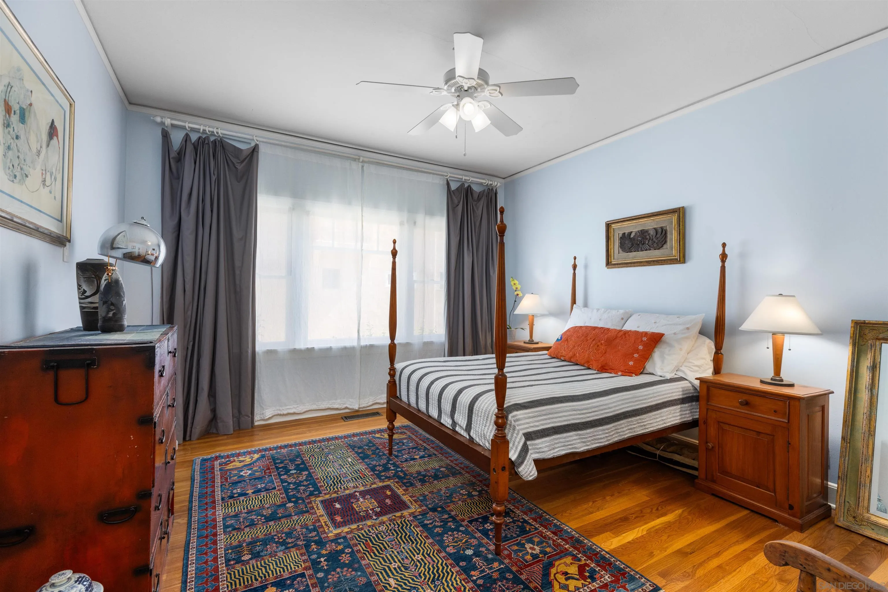 4192 Rochester Road San Diego, CA 92116 - Photo 18 of 38 a bedroom with bed and window