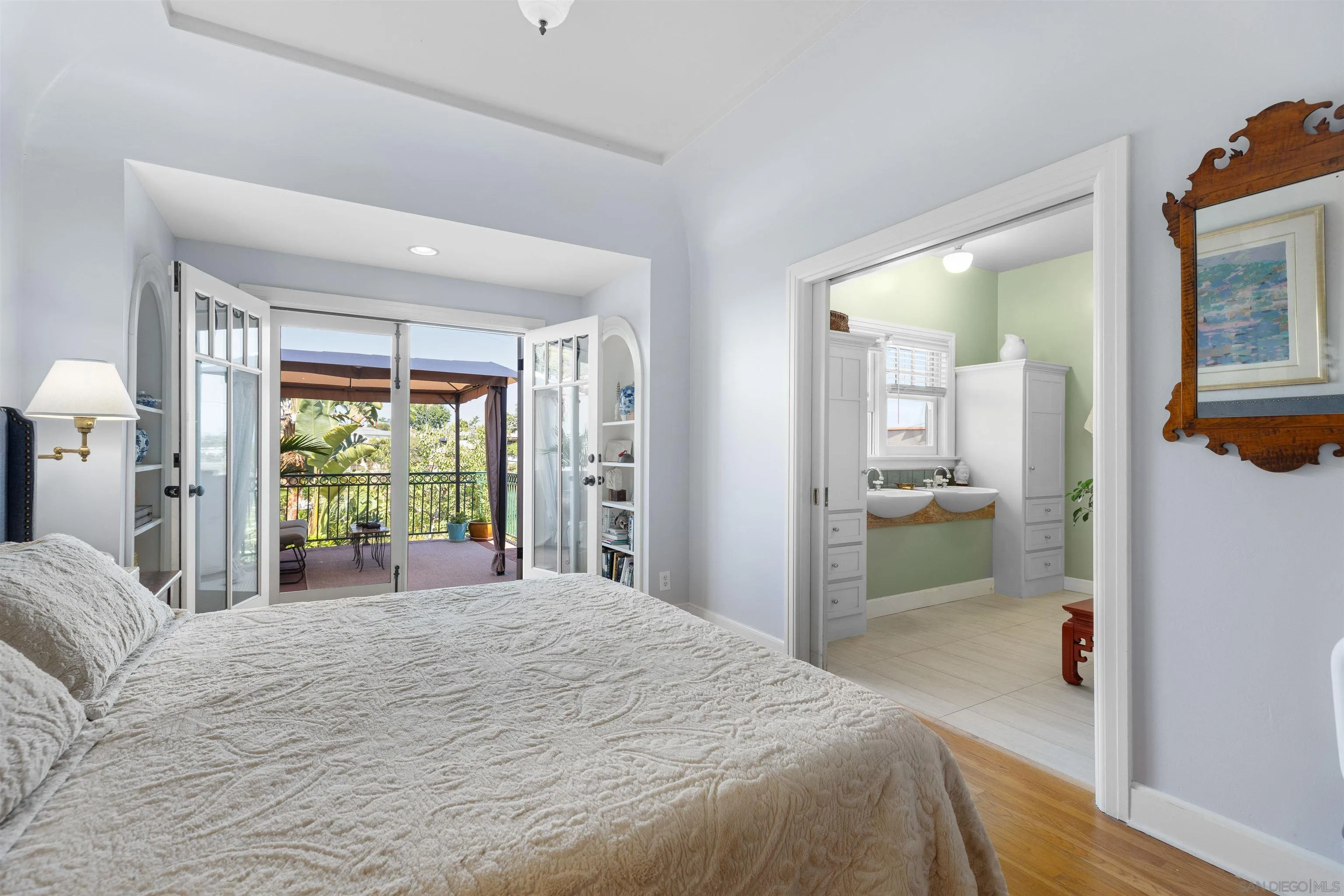 4192 Rochester Road San Diego, CA 92116 - Photo 21 of 38 a bedroom with a bed and a large window