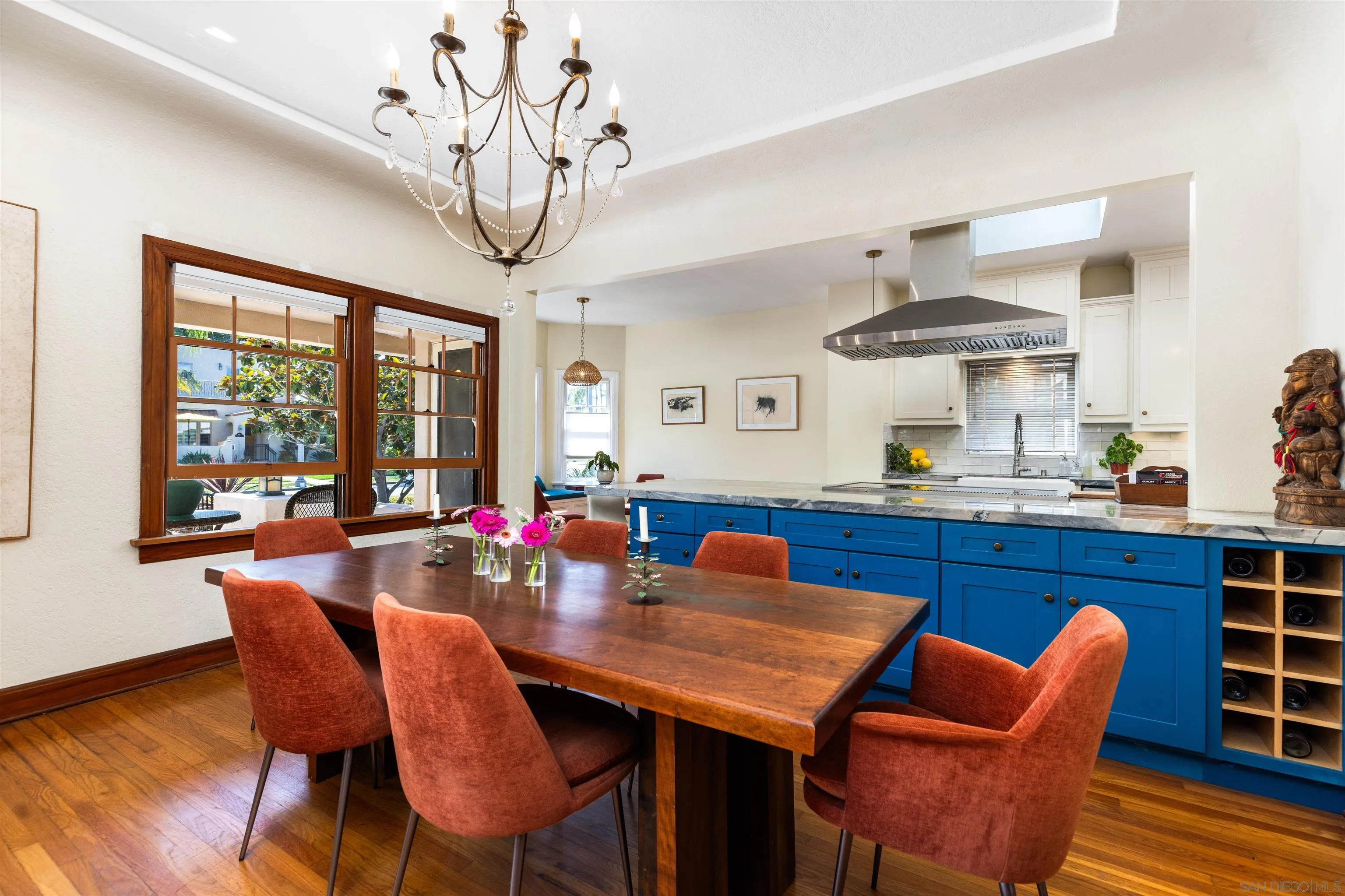 4192 Rochester Road San Diego, CA 92116 - Photo 3 of 38 a view of a dining room with furniture window and wooden floor