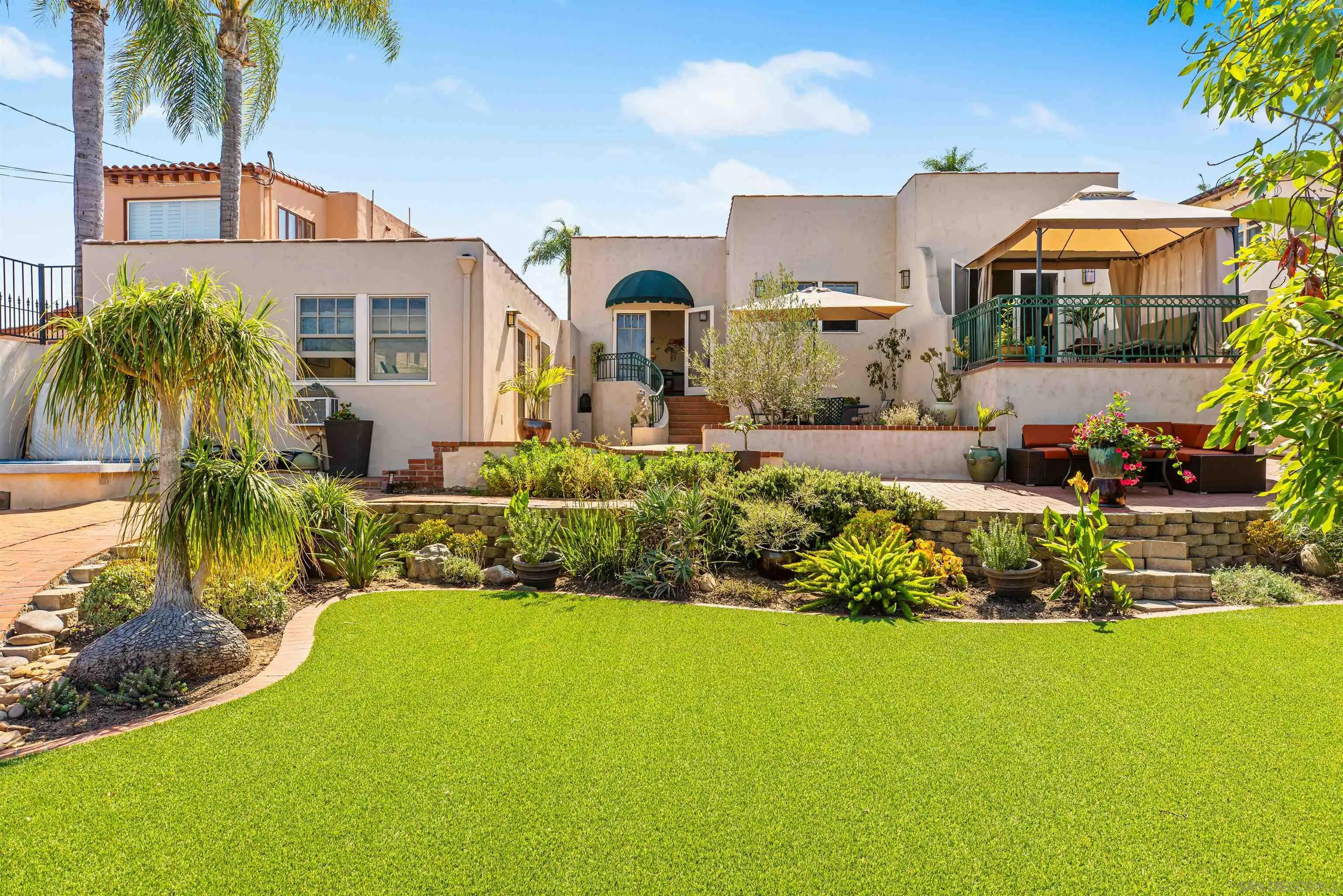 4192 Rochester Road San Diego, CA 92116 - Photo 33 of 38 a view of a house with a swimming pool