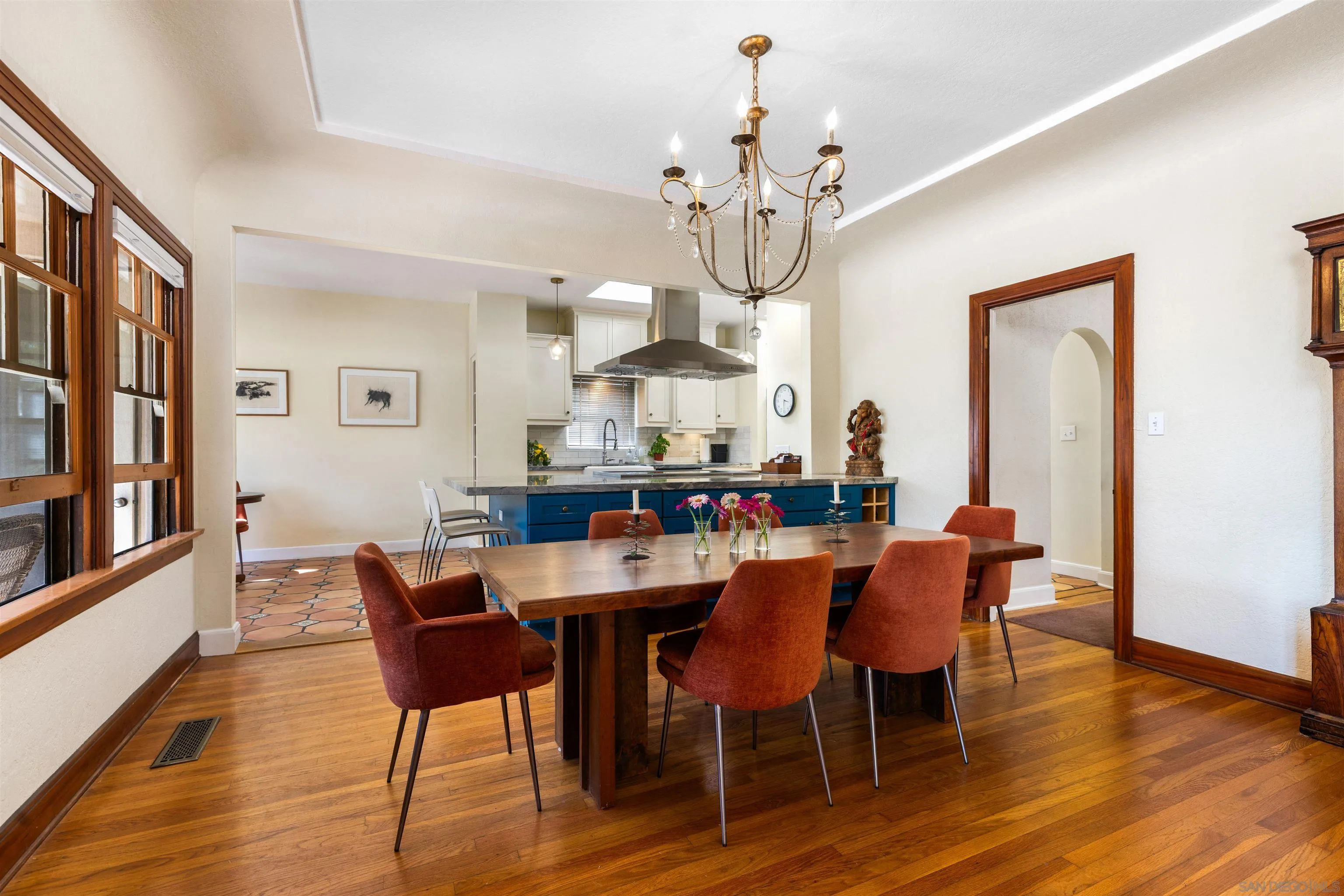4192 Rochester Road San Diego, CA 92116 - Photo 5 of 38 a view of a dining room with furniture wooden floor and chandelier