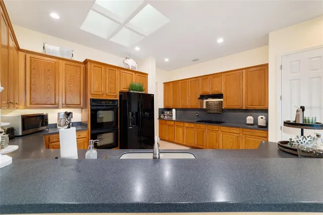 a view of a living room and dining room