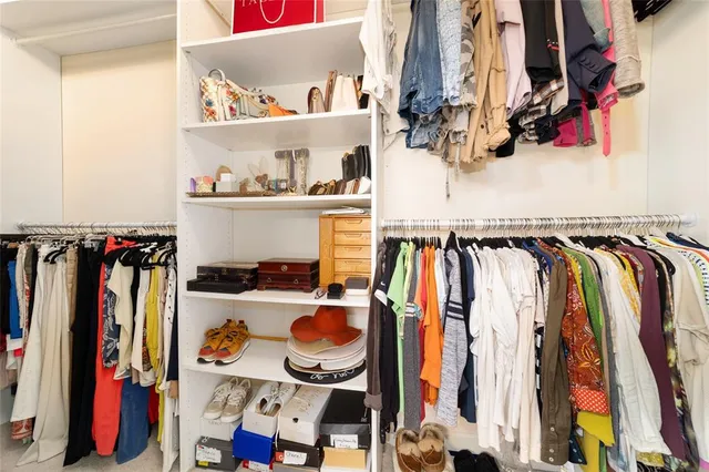 a view of a house with backyard and porch