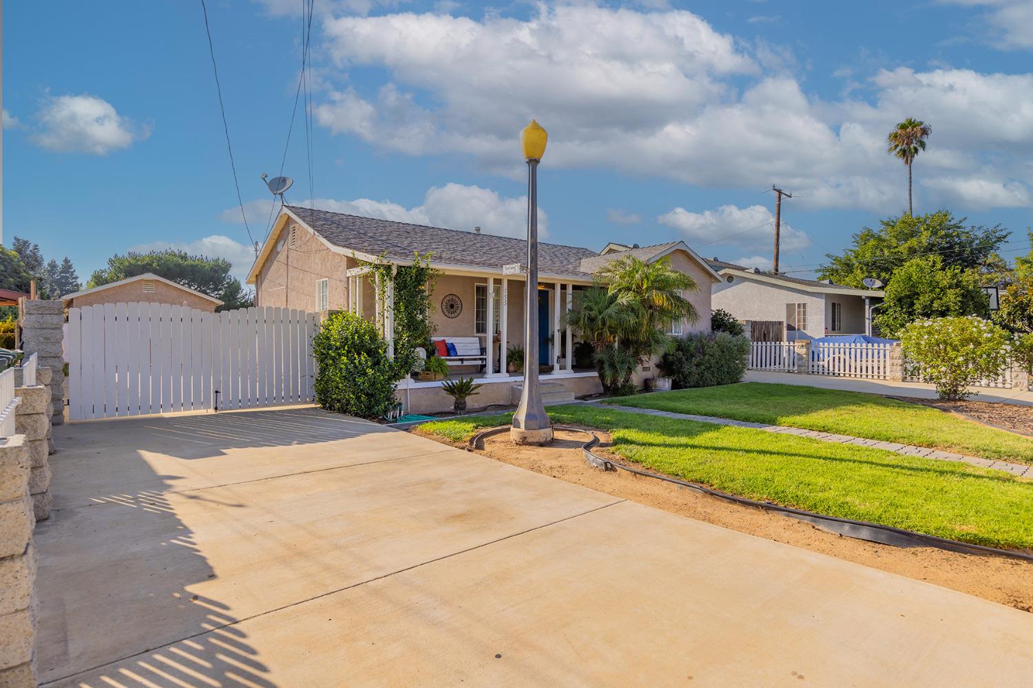 755 Spring Street Oak View, CA 93022 - Photo 26 of 29 a backyard of a house with table and chairs