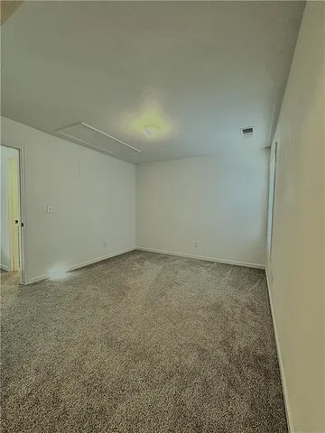 an empty room with a workbench