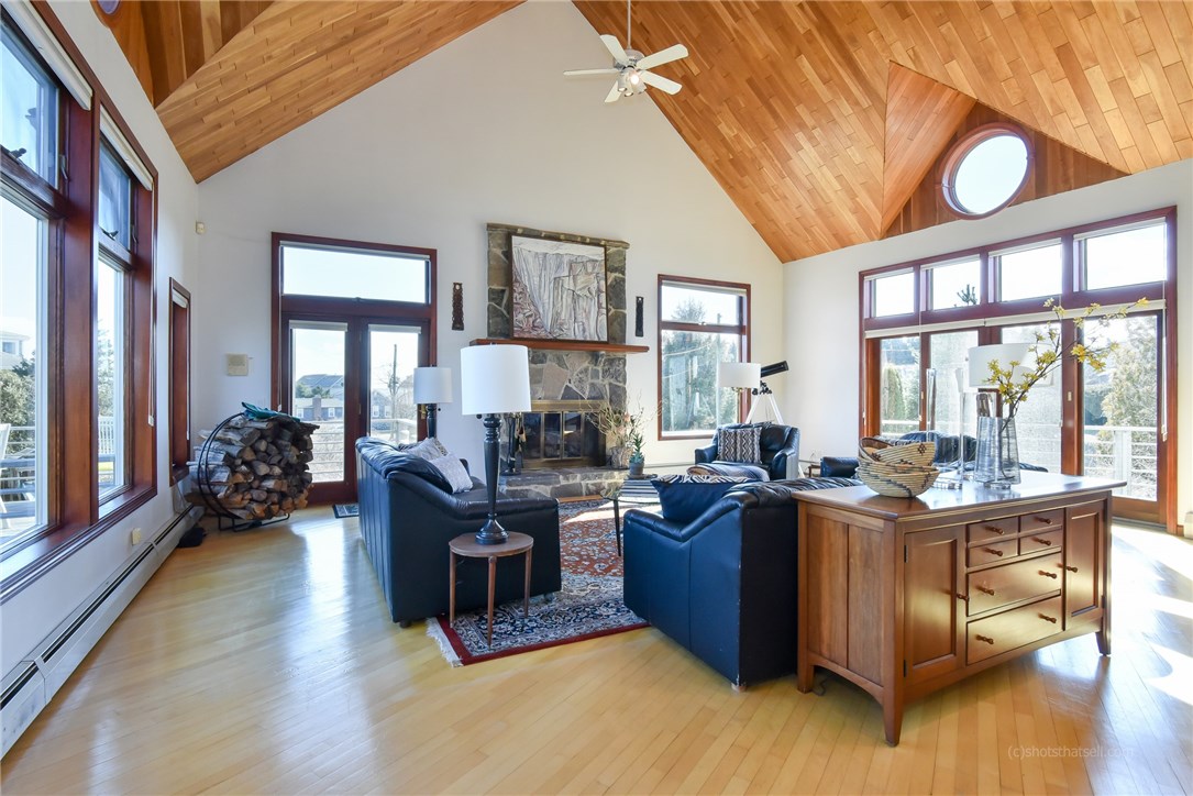 20 Grey Gull Road Jamestown, RI 02835 - Photo 13 of 40 Spacious Living Room is 24' by 28', with another woodburning fireplace!