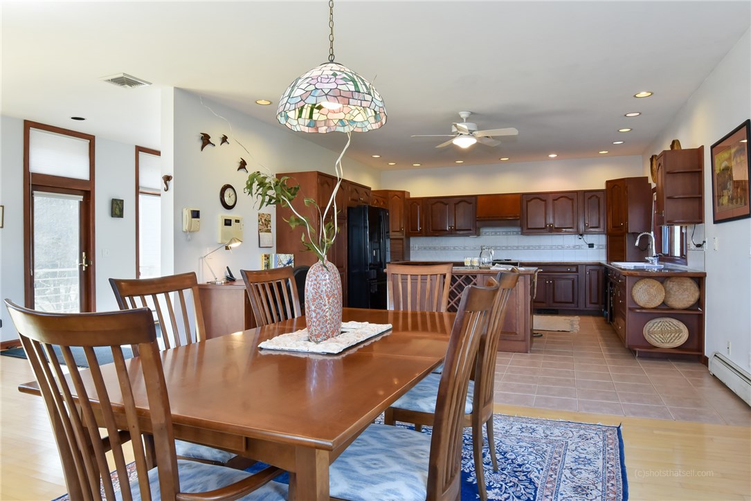 20 Grey Gull Road Jamestown, RI 02835 - Photo 19 of 40 Dining Area....look at that Kitchen, lots of great storage and light!