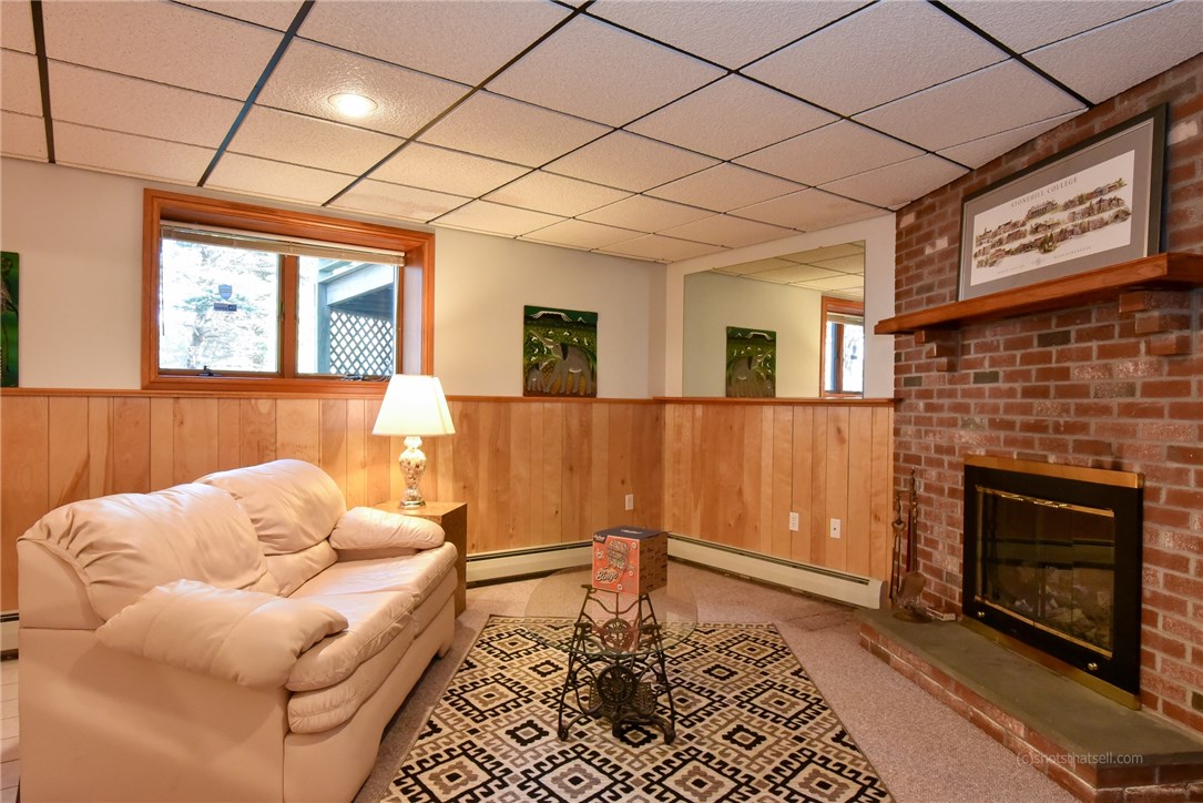 20 Grey Gull Road Jamestown, RI 02835 - Photo 32 of 40 Lower Level Recreation Room, with woodburning fireplace, is 17' x 23'!