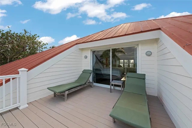 a backyard of a house with seating space