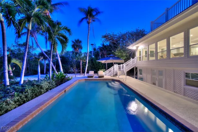 a view of a house with swimming pool