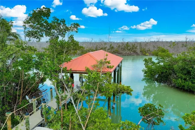 a view of a lake with a garden