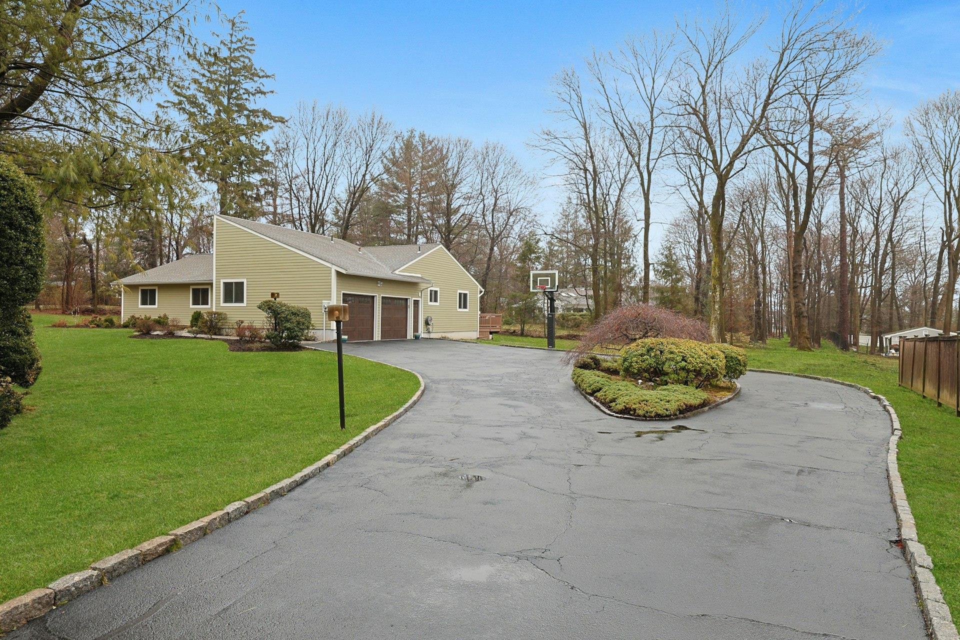 698 Bear Ridge Road Pleasantville, NY 10570 - Photo 1 of 1 View of home's exterior with a Two car attached garage