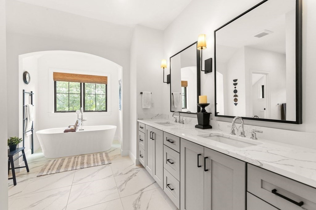 231 Marrett Road Lexington, MA 02421 - Photo 14 of 24 a spacious bathroom with a double vanity sink mirror and bathtub