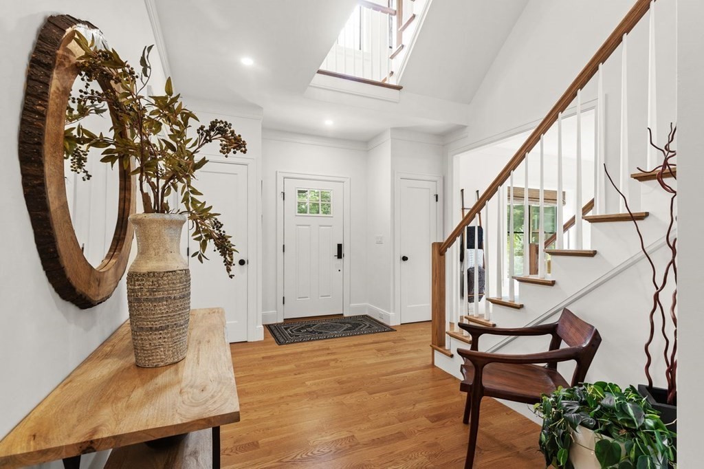 231 Marrett Road Lexington, MA 02421 - Photo 3 of 24 a view of an entryway with wooden floor