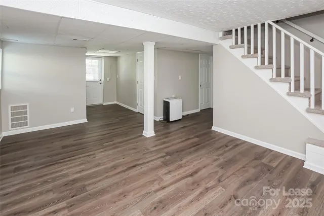 a view of entryway with wooden floor