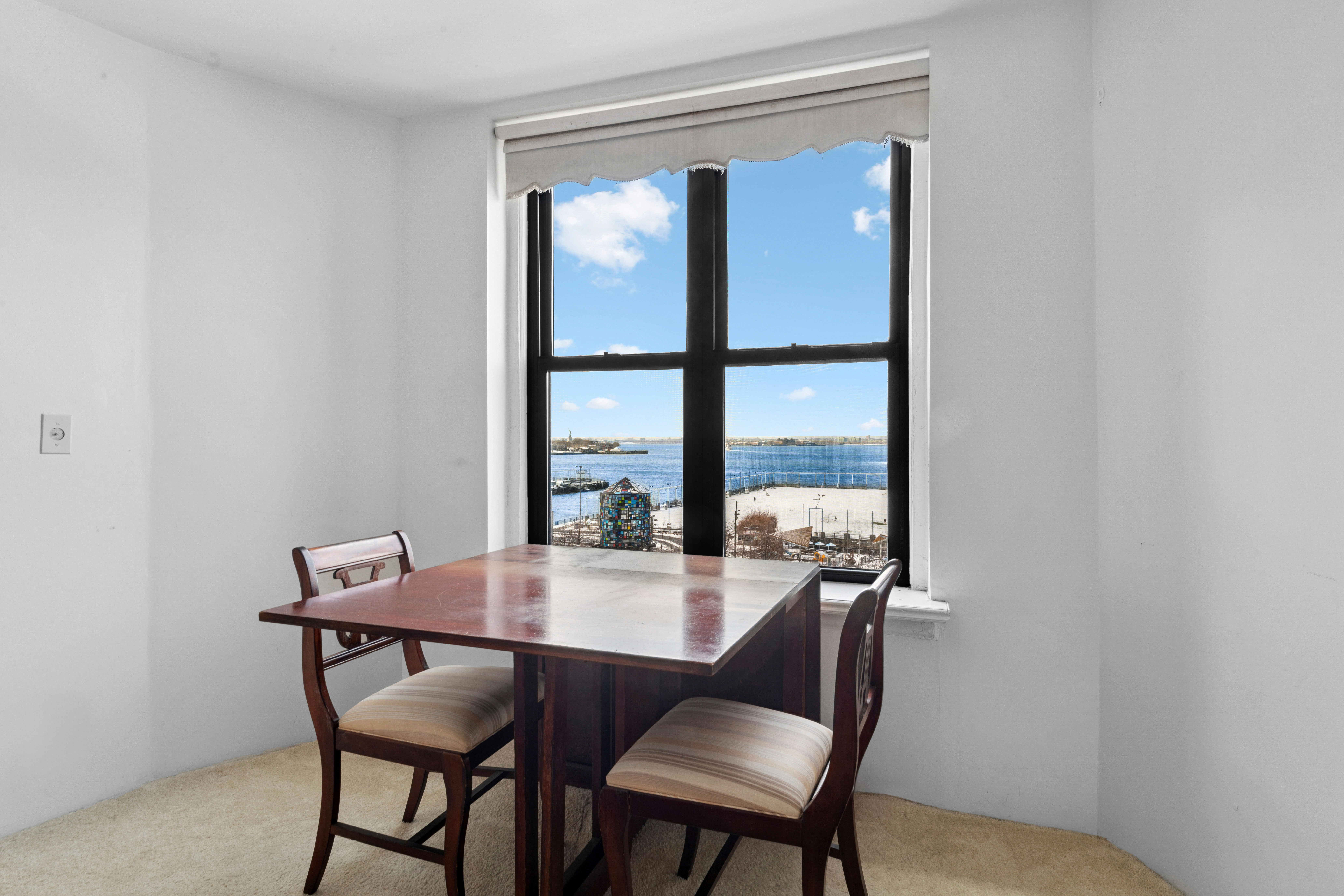 2 Grace Court, Unit 3X Brooklyn, NY 11201 - Photo 3 of 8 a view of a dining room with furniture and window