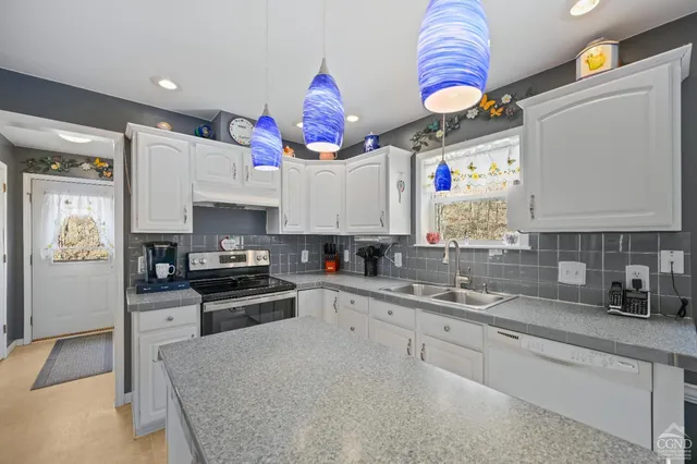 a bedroom with bed and a window