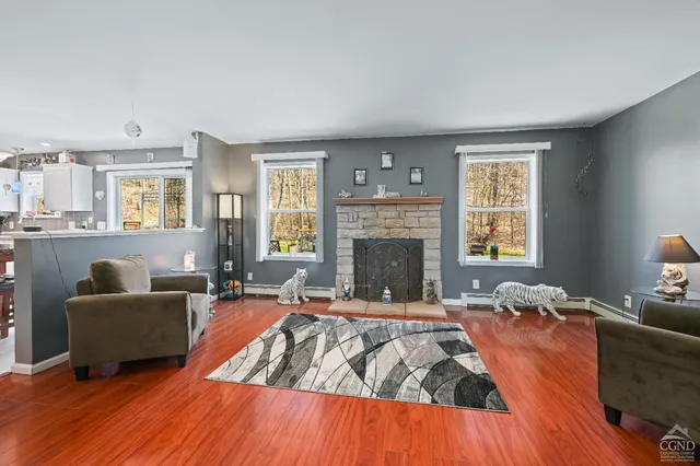a view of a chair in a yard with a house