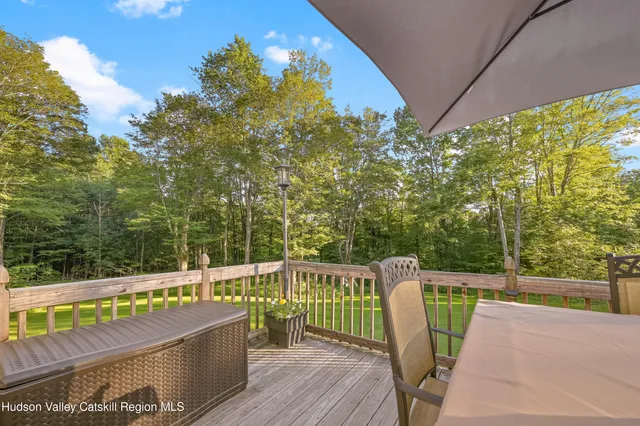 a kitchen with stainless steel appliances kitchen island granite countertop a refrigerator and microwave