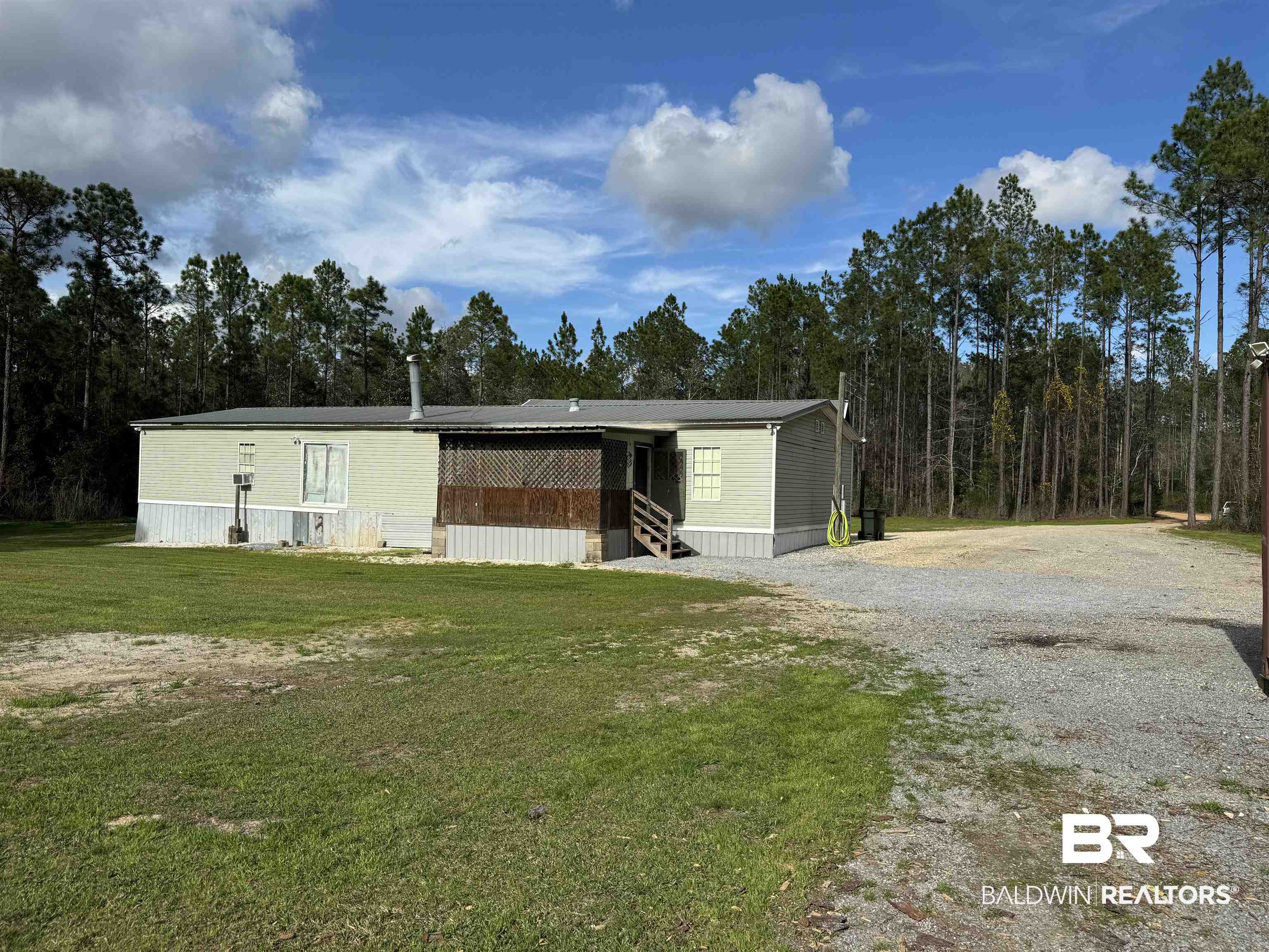 51235 Phillipsville Road Bay Minette, AL 36507 - Photo 43 of 63 View of outdoor structure with gravel driveway and entry steps