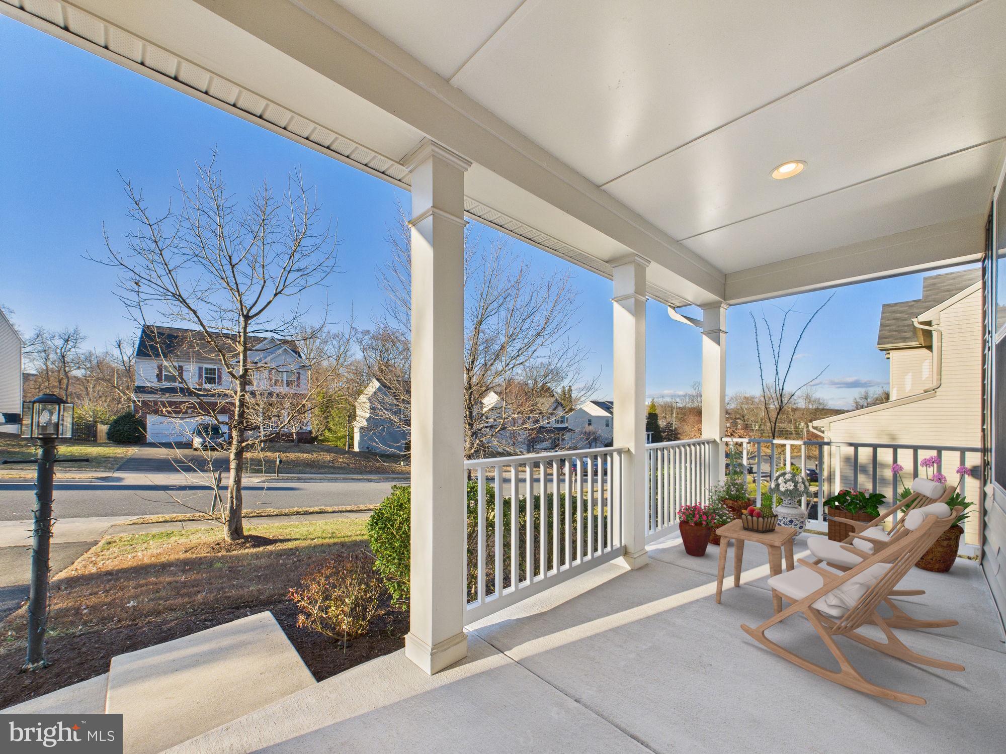 18213 Jillian Lane Triangle, VA 22172 - Photo 3 of 41 a view of a patio with a table and chairs