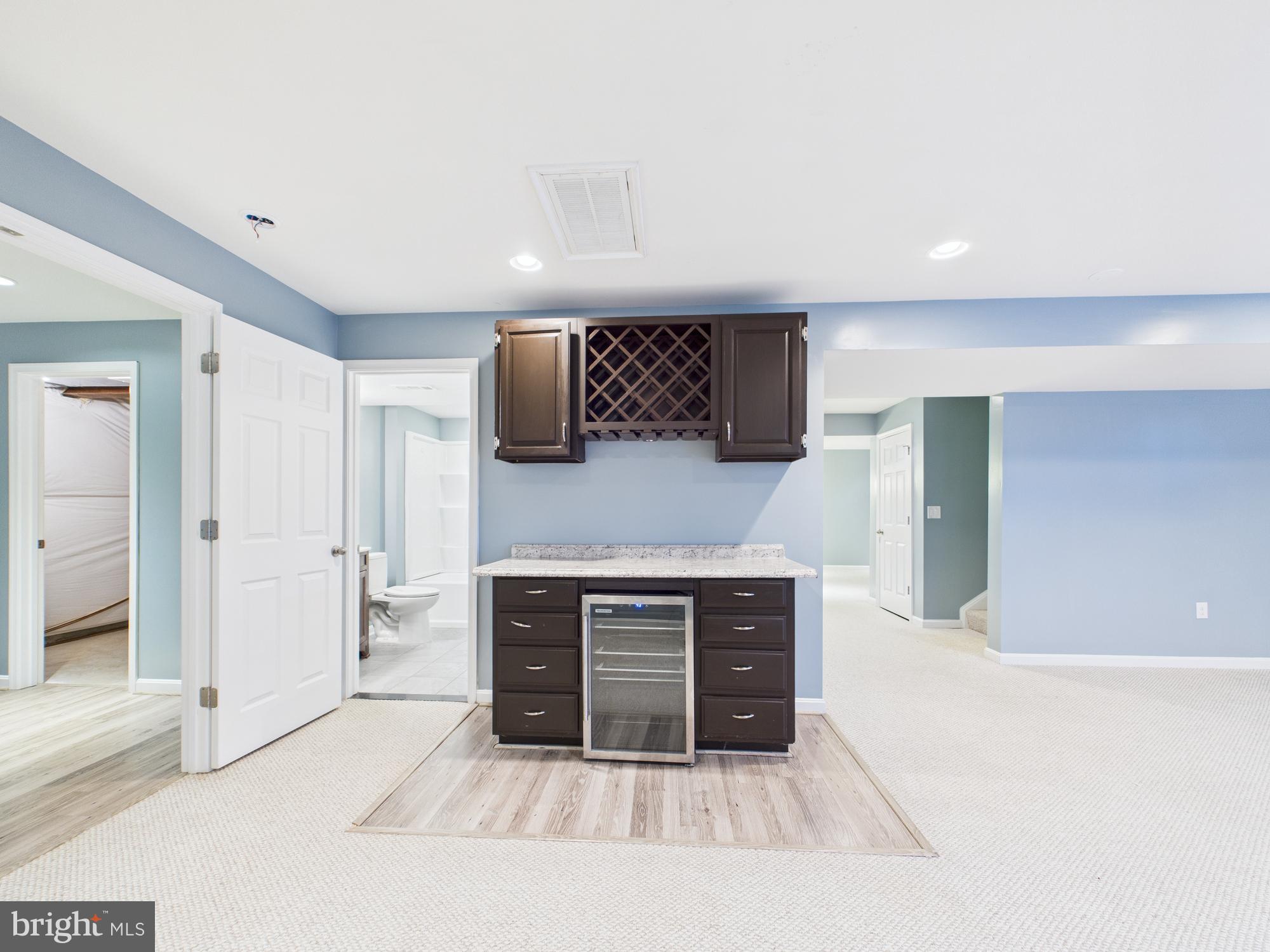 18213 Jillian Lane Triangle, VA 22172 - Photo 31 of 41 Basement Entertainment area, wetbar