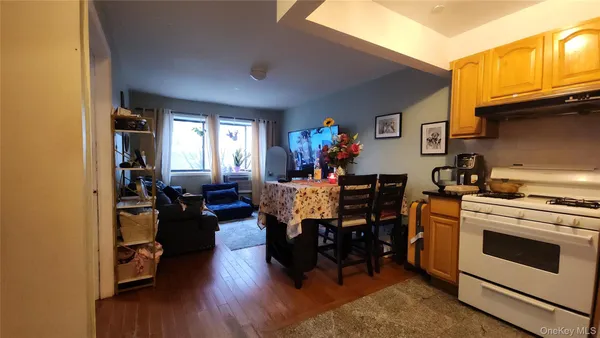 a view of a living room and dining room