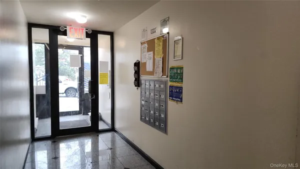 a view of a hallway with windows