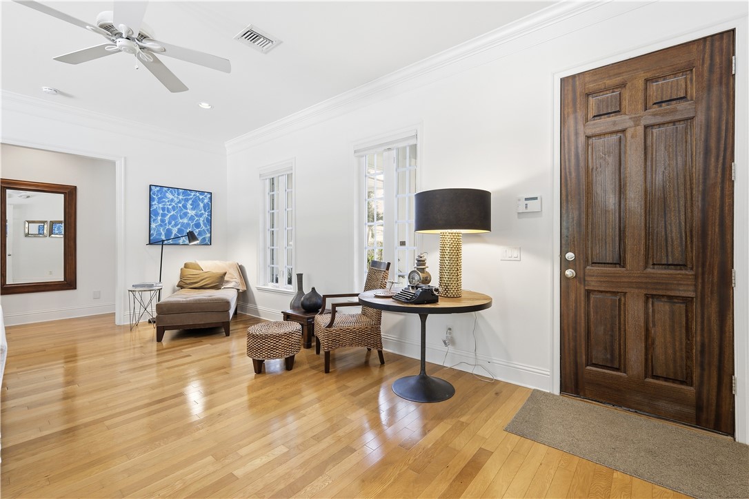 2116 Cavalla Road Vero Beach, FL 32963 - Photo 4 of 23 a living room with furniture and a wooden floor