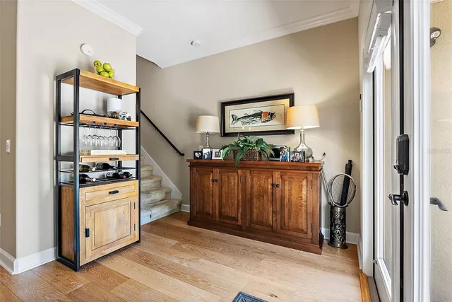 a kitchen with stainless steel appliances granite countertop a refrigerator and a stove