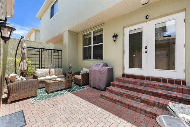 a bedroom with furniture and windows