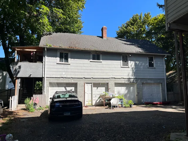 a front view of a house with patio