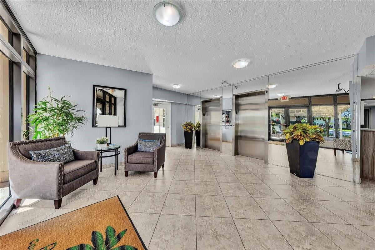 545 Oaks Lane, Unit 403 Pompano Beach, FL 33069 - Photo 4 of 42 Secure lobby